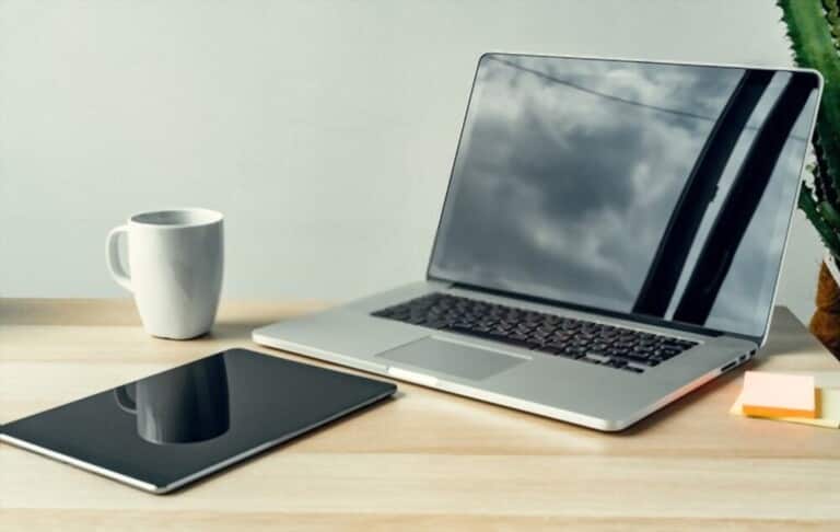 tablet and laptop on the table