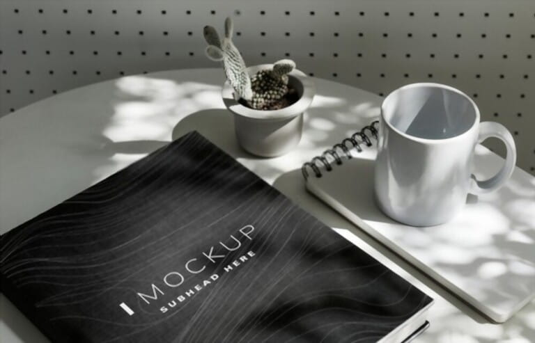 Black textbook cover mockup on a table