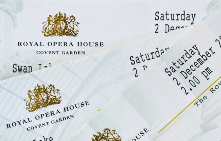 Close up of tickets for a production of Swan Lake at the Royal Opera House Covent Garden, London Close up of tickets for a production of Swan Lake at the Royal Opera House Covent Garden, London