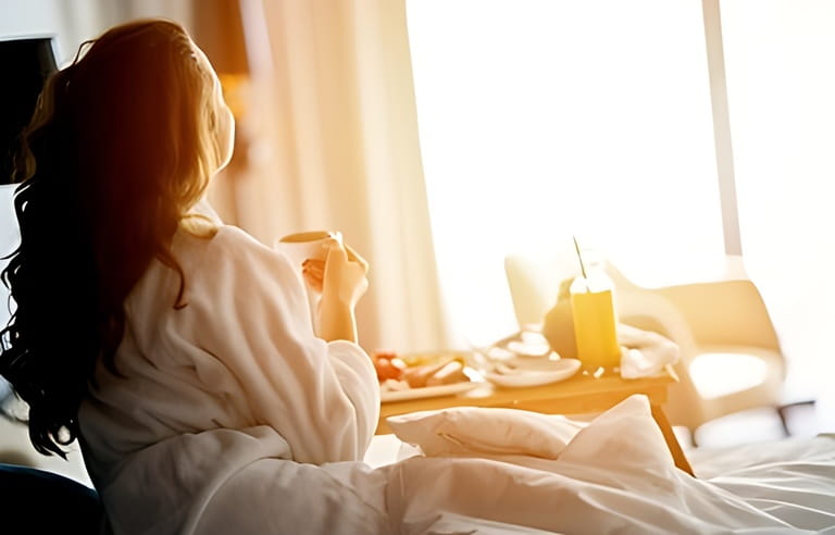 Breakfast in bed, cozy hotel room. Concept Breakfast in bed, cozy hotel room. Concept